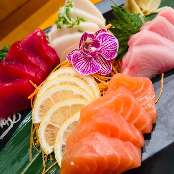 Sashimi platter with salmon, tuna, and yellowtail