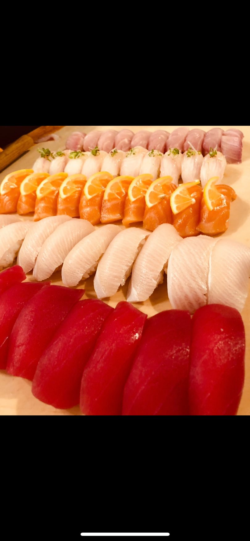 Fresh nigiri assortment with tuna, salmon, yellowtail, and white fish